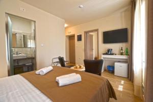 Postel nebo postele na pokoji v ubytování App & Rooms Juraga