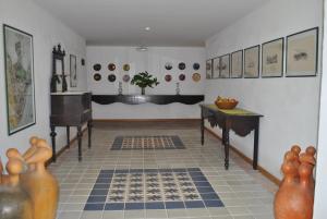 Uma área de estar em Hotel 7 Colinas