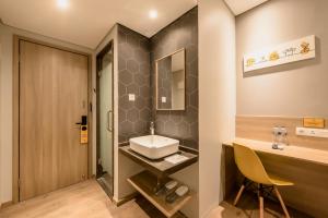Letto o letti in una camera di Yellow Bee Tanah Abang