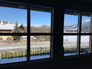 Nespecifikovaný výhled na hory nebo výhled na hory při pohledu z apartmánu