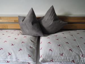 Letto o letti in una camera di Gästehaus Hechenblaikner