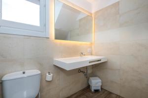 Kúpeľňa v ubytovaní Apartamentos Playa Canutells
