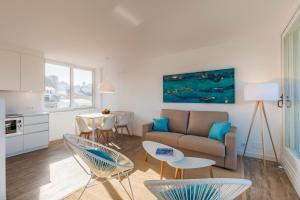 Kuchyň nebo kuchyňský kout v ubytování Apartamentos Playa Canutells
