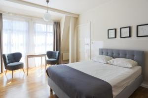 Łóżko lub łóżka w pokoju w obiekcie Apartamenty Świnoujście - Villa Stil 1