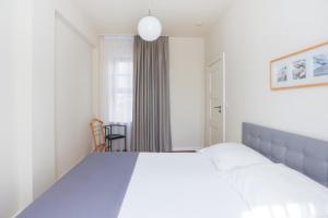 Łóżko lub łóżka w pokoju w obiekcie Apartamenty Świnoujście - Villa Stil 1