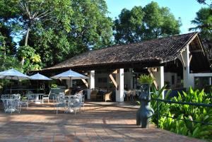 Um restaurante ou outro lugar para comer em Hotel 7 Colinas