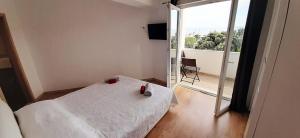 Posteľ alebo postele v izbe v ubytovaní Penthaus Apartment N&M