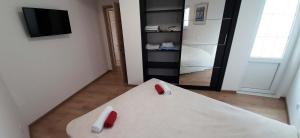 Posteľ alebo postele v izbe v ubytovaní Penthaus Apartment N&M