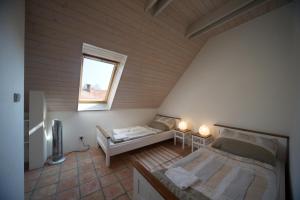 Tempat tidur dalam kamar di U Mišpule