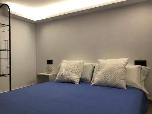 A bed or beds in a room at Moderno Loft a 150 metros de la playa