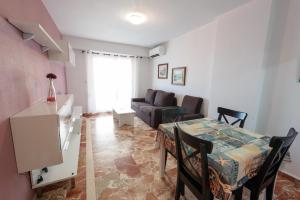 A seating area at Apartamentos Nuevo México M 54