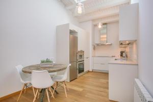 Kuchyň nebo kuchyňský kout v ubytování Apartaments Catedral – Baltack Homes