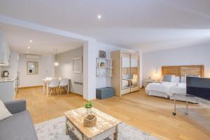 TV a/nebo společenská místnost v ubytování Apartaments Catedral – Baltack Homes