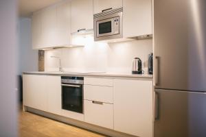 Kuchyň nebo kuchyňský kout v ubytování Apartaments Catedral – Baltack Homes