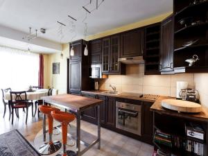 Kuchnia lub aneks kuchenny w obiekcie Trinity Apartment