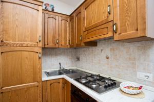 Kuchyň nebo kuchyňský kout v ubytování Appartamento in Via del Mare a Procchio