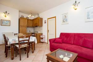 Kuchyň nebo kuchyňský kout v ubytování Appartamento in Via del Mare a Procchio