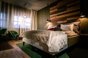 Postel nebo postele na pokoji v ubytování Canyon Hotell
