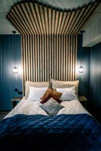 Postel nebo postele na pokoji v ubytování Canyon Hotell