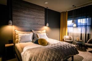 Postel nebo postele na pokoji v ubytování Canyon Hotell