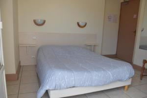 Postel nebo postele na pokoji v ubytování Hotel Gai Relais