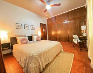 Säng eller sängar i ett rum på Villa Ignacia B&B - Habitaciones & Apartamentos en Plena Naturaleza