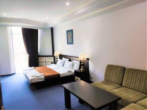 Postel nebo postele na pokoji v ubytování DDD Hotel + 37 fotografií