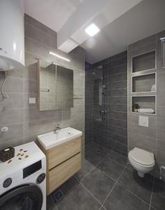 Ett badrum på Apartments STEP