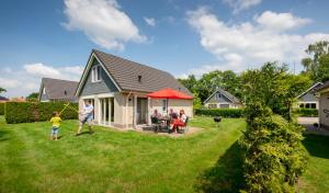 Κήπος έξω από το Vakantiepark Bosmeer Friesland