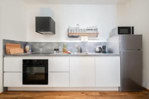 Kuchyňa alebo kuchynka v ubytovaní Apartmány Resort Vrchlabí