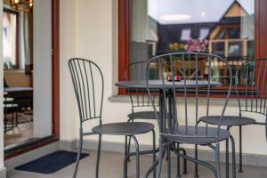 Reštaurácia alebo iné gastronomické zariadenie v ubytovaní Apartament Zielony Blisko Krupówek