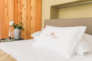 Postel nebo postele na pokoji v ubytování Hotel Penzion Kobala