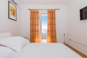 Ένα ή περισσότερα κρεβάτια σε δωμάτιο στο Villa Violeta With Amazing Sea View +41 φωτογραφίες