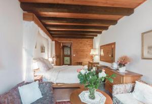 Postel nebo postele na pokoji v ubytování L'Auberge du Choucas