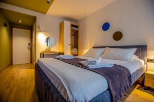 Postel nebo postele na pokoji v ubytování Hotel 4 Llulla