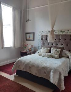 Säng eller sängar i ett rum på Smithfield House