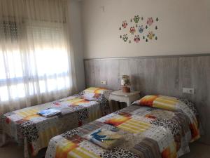 A bed or beds in a room at CAL53