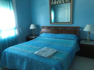 A bed or beds in a room at CAL53