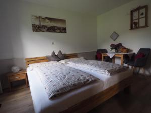 Letto o letti in una camera di Gästehaus Hechenblaikner