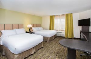 Ένα ή περισσότερα κρεβάτια σε δωμάτιο στο Candlewood Suites Bowling Green, an IHG Hotel