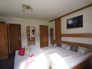 Letto o letti in una camera di Gästehaus Hechenblaikner