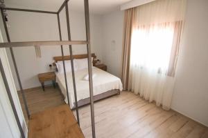 Postel nebo postele na pokoji v ubytování Casa Villa, Xenia Paliouri