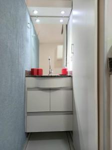 Ett badrum på Flat & Residence Premium - Apês mobiliados e bem equipados