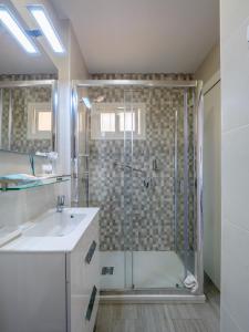 Koupelna v ubytování Honeymoon Apartments