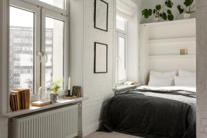 Postel nebo postele na pokoji v ubytování Lwowska Apartment - Lwowska 9