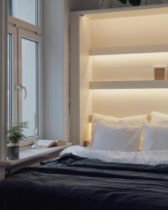 Postel nebo postele na pokoji v ubytování Lwowska Apartment - Lwowska 9