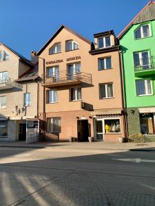 a large building on the side of a street at GWIAZDA MORZA in Hel