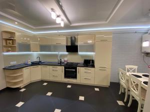 A kitchen or kitchenette at Luxury apartments