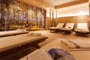 A bed or beds in a room at Hotel Erika