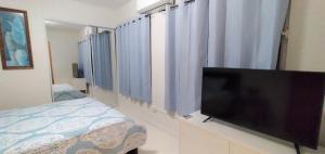 TV a/nebo společenská místnost v ubytování Mar Bonita Beach Appartment II